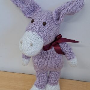 Standing knitted donkey